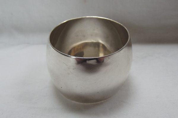 Wide picture of silver barrel shaped napkin ring