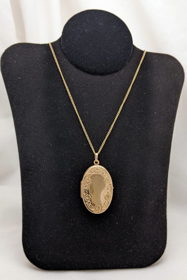 Gold oval locket necklace